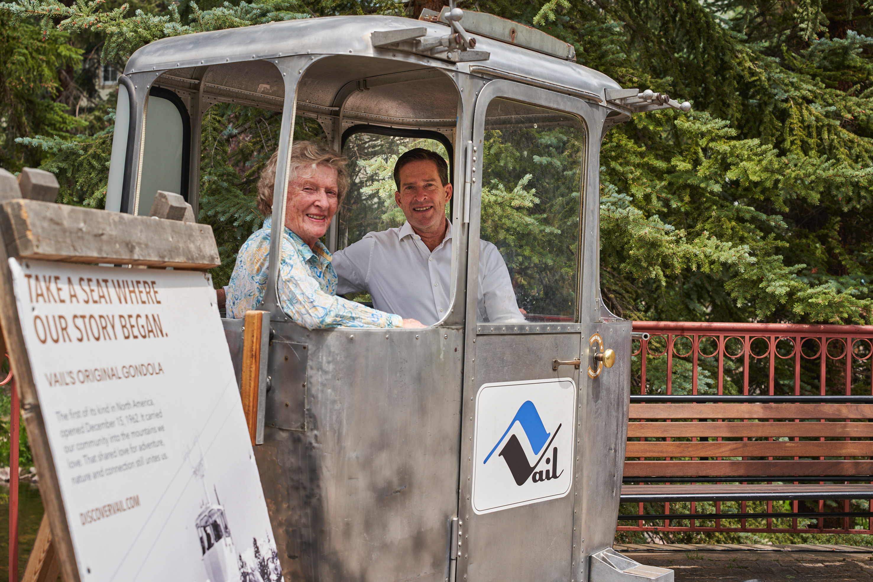 Carroll Tyler seated with her son John Tyler inside Vail's original gondola car in Vail Village